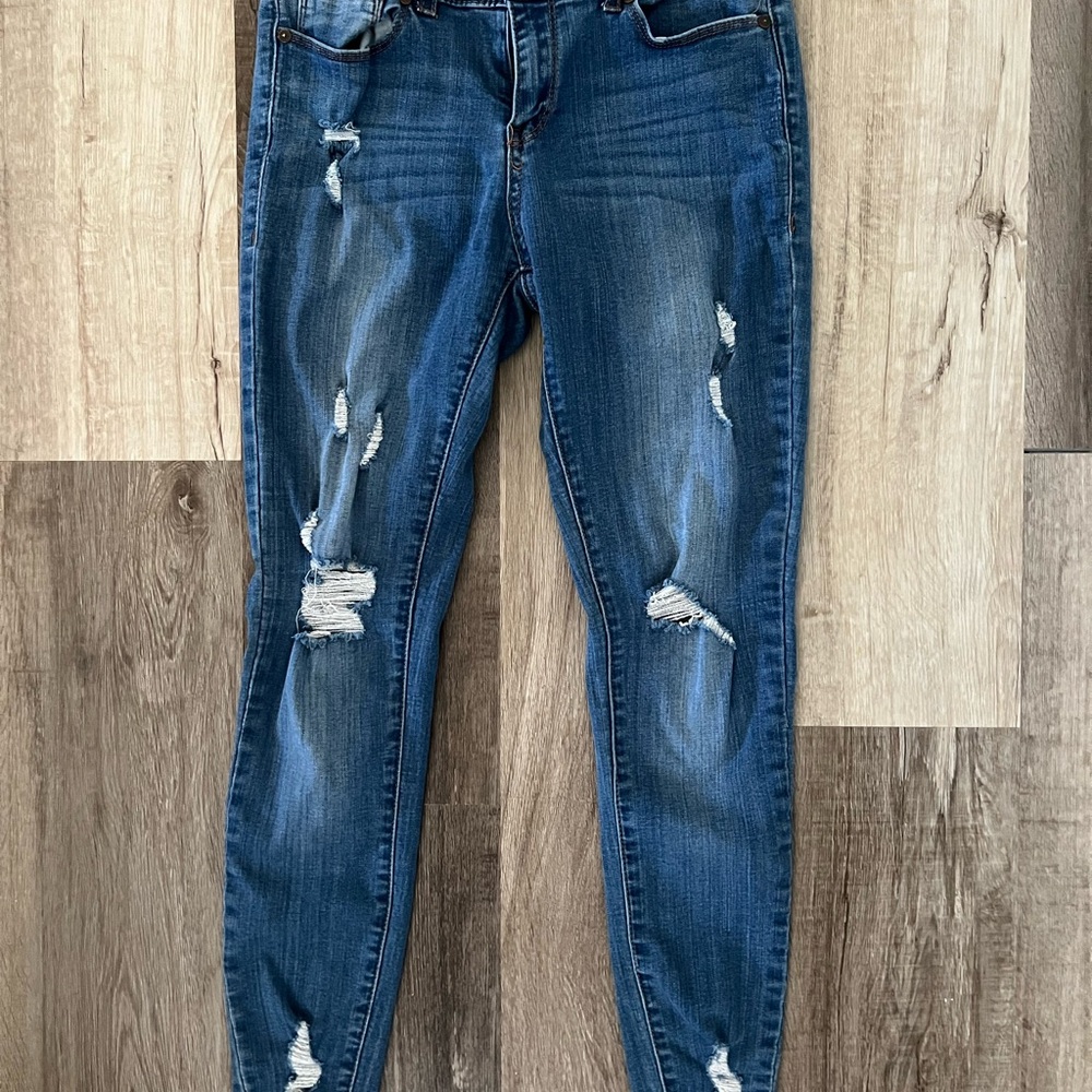 Distressed Blue Jeans
